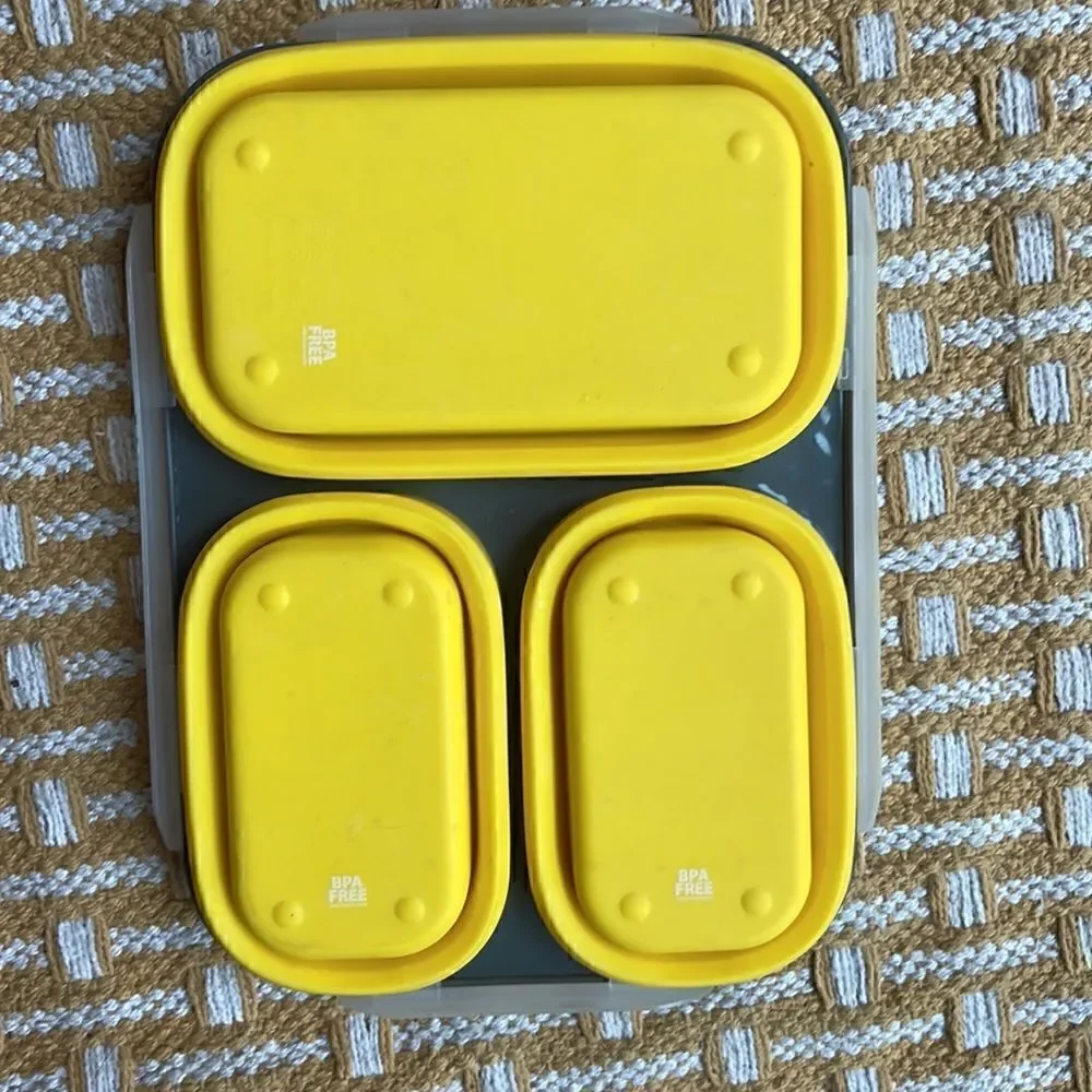 Eco One collapsible lunch box.  Snap lid with utensil pocket.  BPA free.